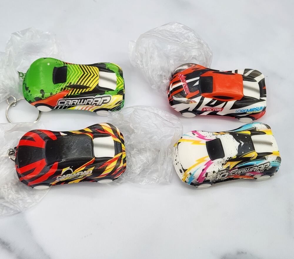 Pack of 4 Squishy Toy Racecar Bag Charms / Keychains Backpack Accessories Lot 1